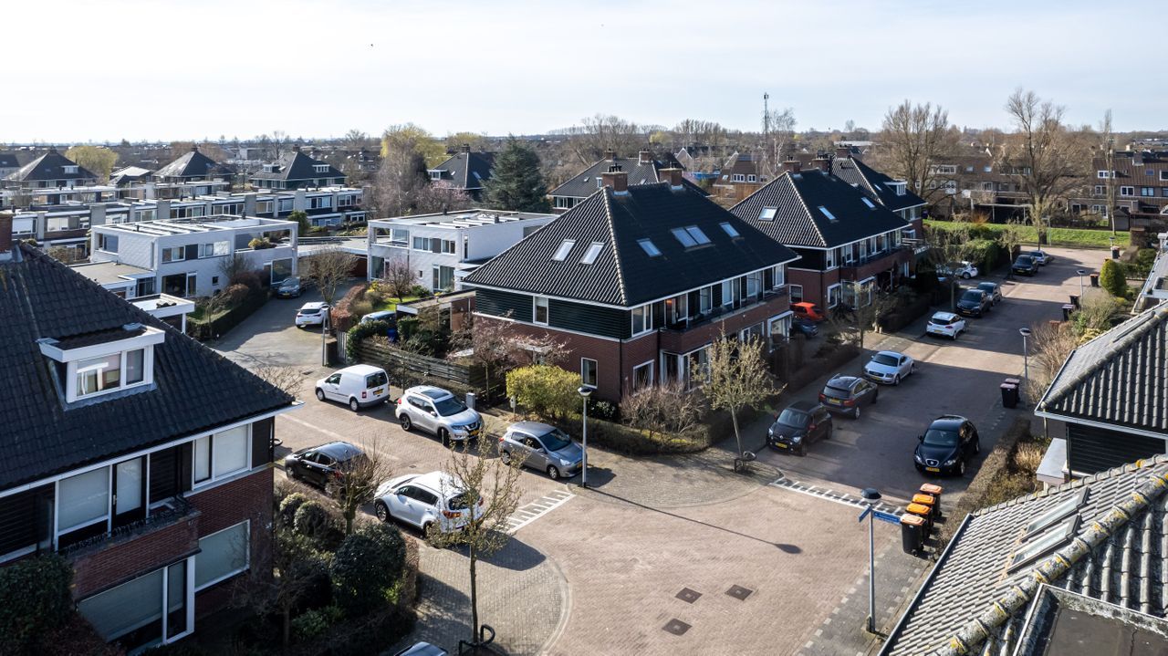 Muiderzand 24, Huizen